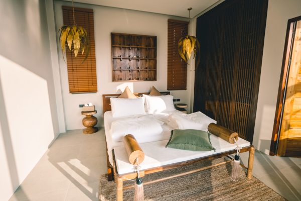 A peaceful bedroom designed for deep rest, privacy, and quiet comfort.